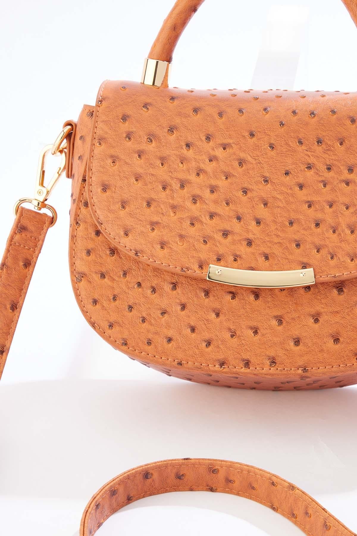 Cato Fashions Textured Faux Leather Round Handle Crossbody