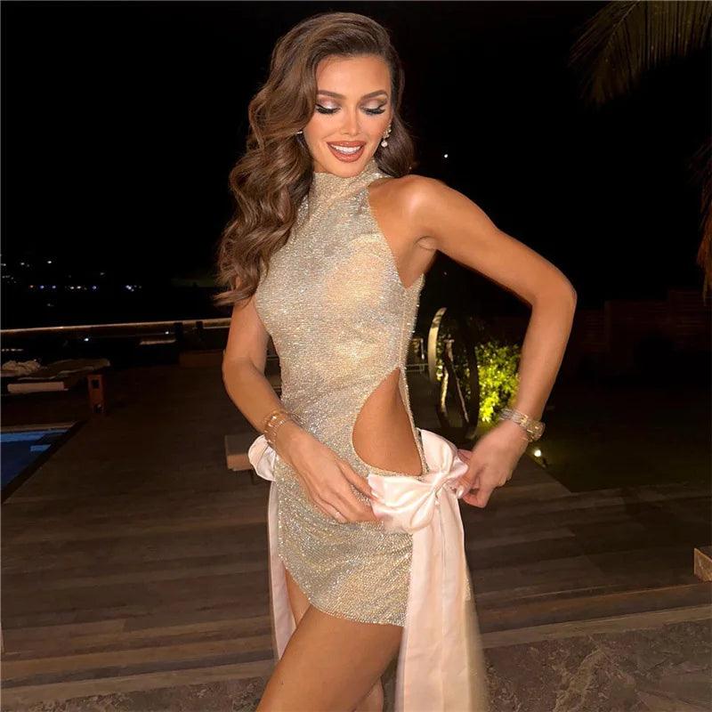 Mermaid Way Tonight's Mystery Bow Cut Out Glitter Mini Dress