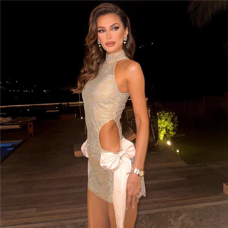 Mermaid Way Tonight's Mystery Bow Cut Out Glitter Mini Dress